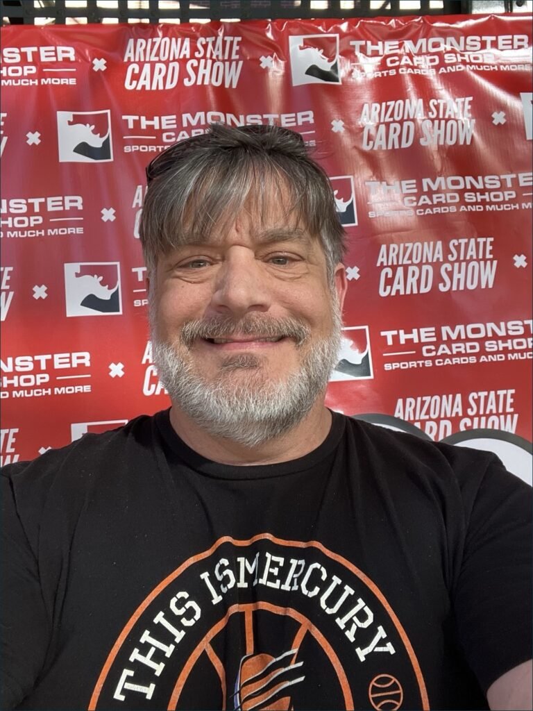 picture of male owner of garage sale sports