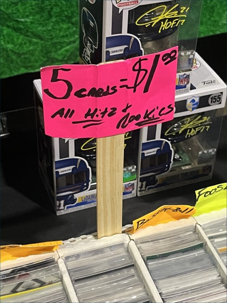 cards on table with sign